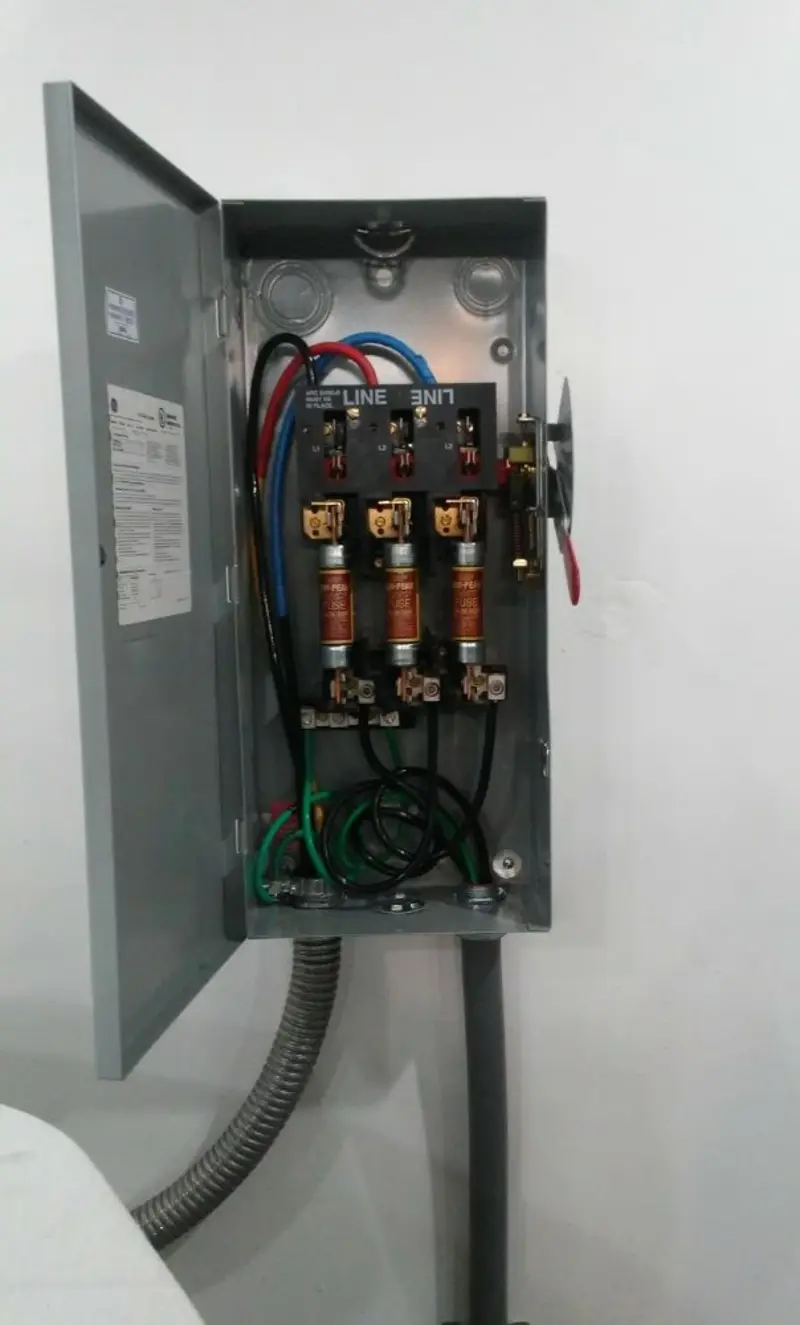 Three-phase disconnect switch installed for Smoke Detector Installation in Goddard